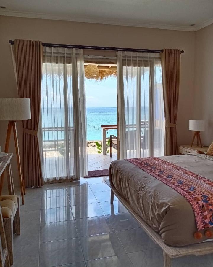 Vns Beachfront Guesthouse Toyapakeh Экстерьер фото